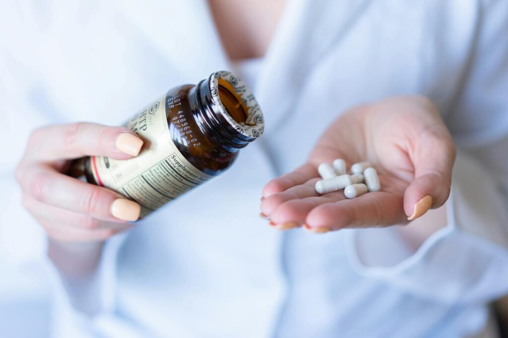 Shopper comparing two supplement bottles in a store aisle