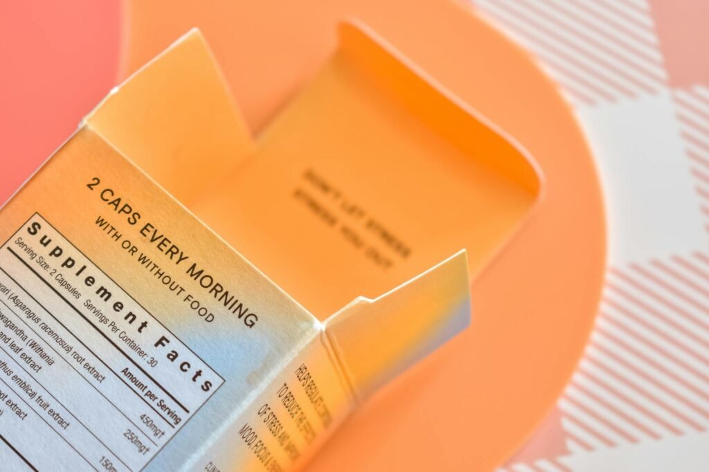 A magnifying glass over a supplement label