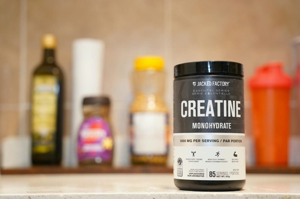 A person reading a Supplement Facts label on a supplement bottle